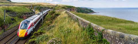 LNER Azuma train travelling along the Berwickshire coast